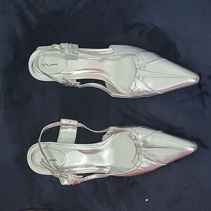 Women size 91/2 Silver leather 2" sling-back, pointed-toe heels